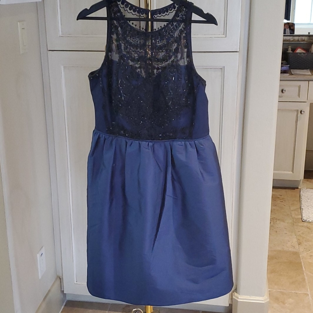 Knee length cocktail dress with sequins